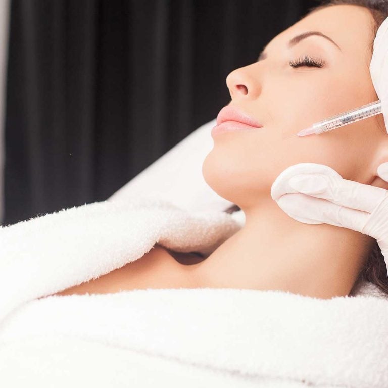 woman getting cheek dermal fillers in chillicothe, ohio